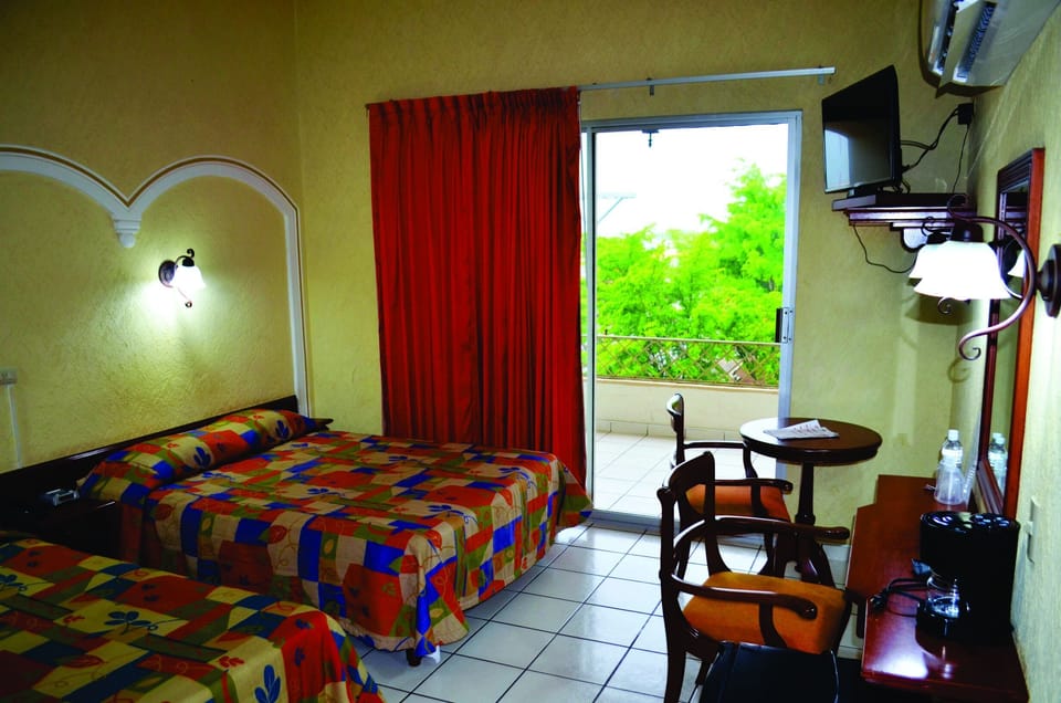 Superior Room, City View | Minibar, laptop workspace, blackout drapes, iron/ironing board