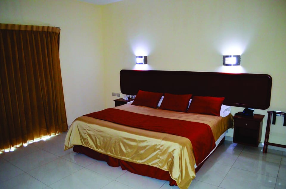 Premium Room, City View | Minibar, laptop workspace, blackout drapes, iron/ironing board
