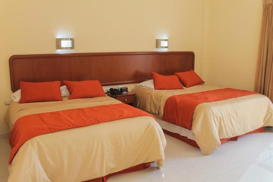 Premium Room, City View | Minibar, laptop workspace, blackout drapes, iron/ironing board