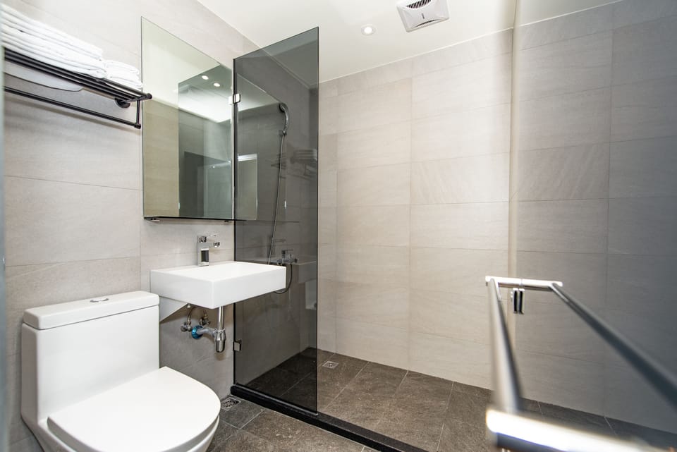 Shower, free toiletries, hair dryer, slippers