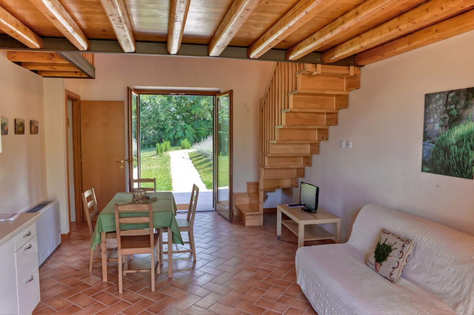 Family Studio, Non Smoking | Living area | Flat-screen TV