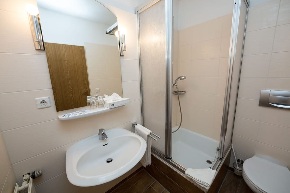 Shower, free toiletries, hair dryer, towels