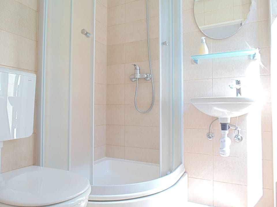 Double Room, Garden View | Bathroom | Shower, free toiletries, hair dryer, slippers