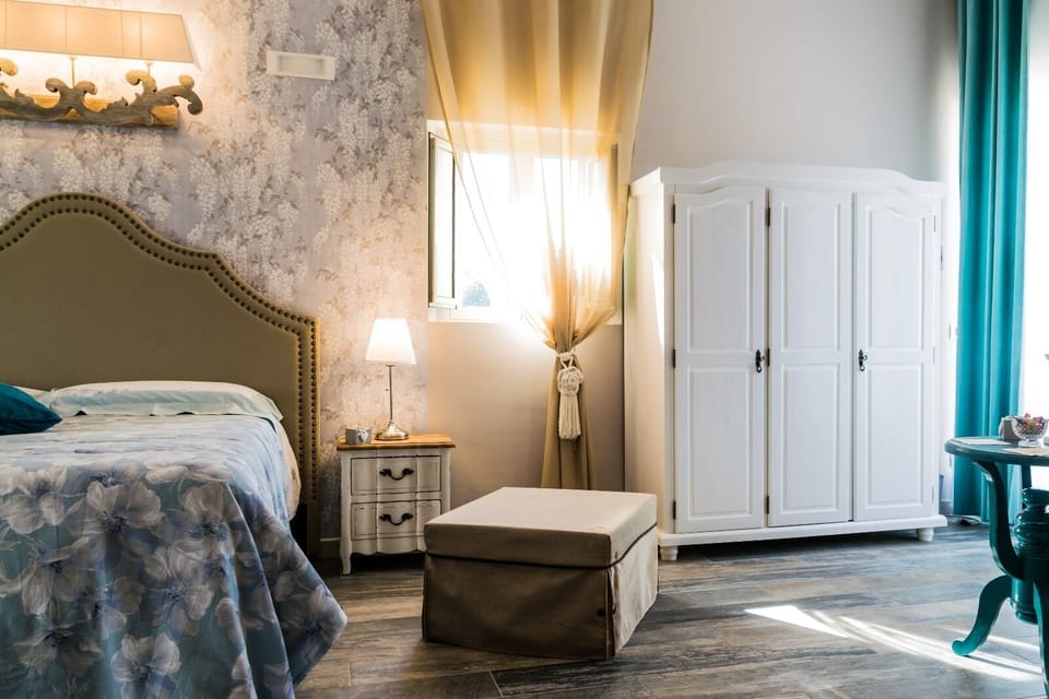 Panoramic Quadruple Room, Terrace, Pool View | Minibar, in-room safe, desk, soundproofing