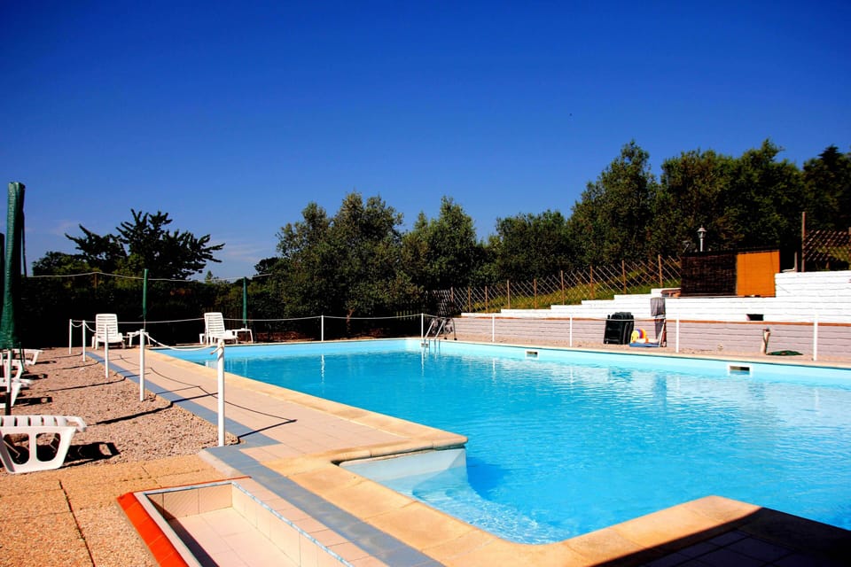 Seasonal outdoor pool, pool umbrellas, sun loungers
