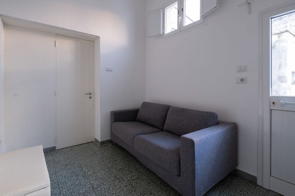 Family Room, Balcony | Living area | Flat-screen TV, fireplace, printers
