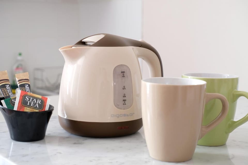 Coffee/tea maker, shared fridge, shared microwave, electric kettle