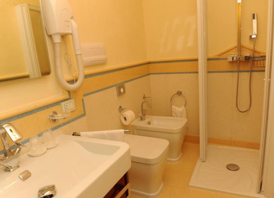 Shower, free toiletries, hair dryer, bathrobes