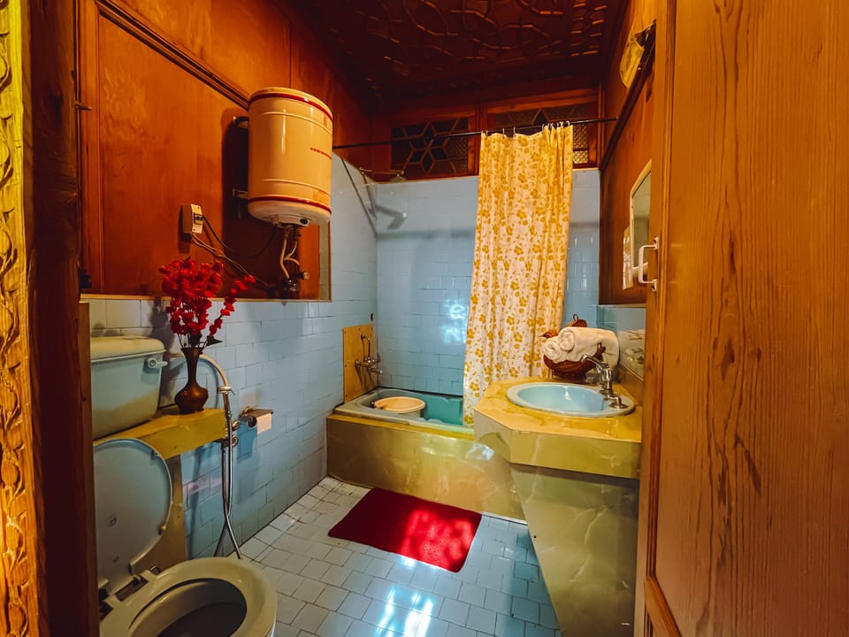 Premium Double Room, 1 Queen Bed | Bathroom | Combined shower/tub, jetted tub, rainfall showerhead, free toiletries