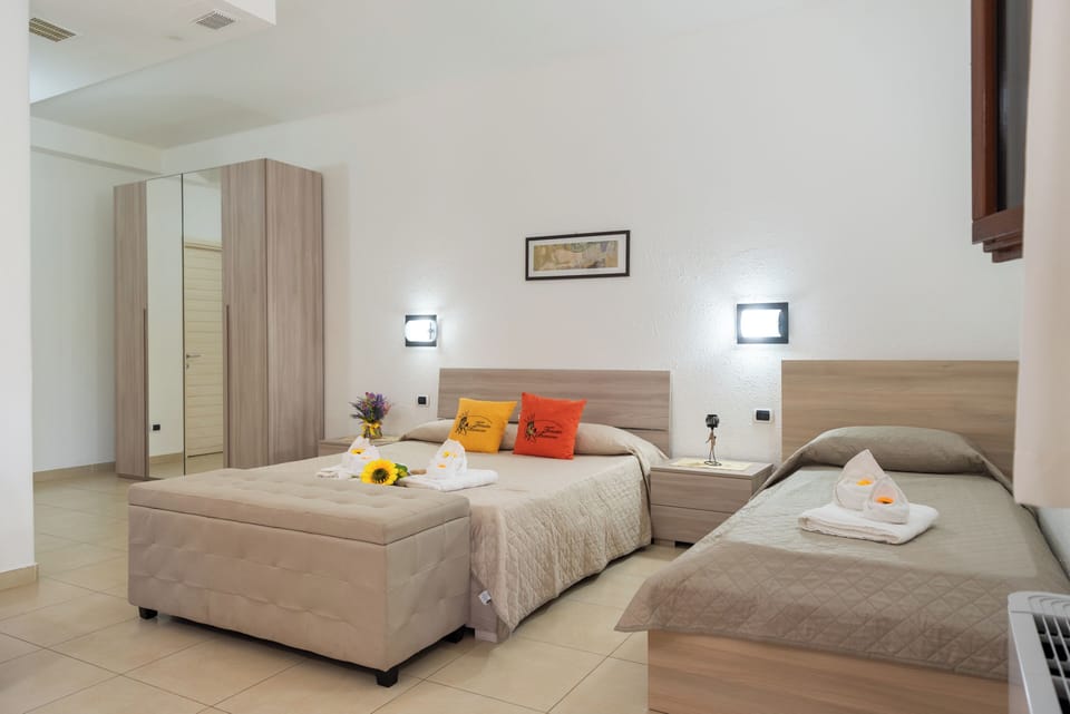 Triple Room | Premium bedding, minibar, in-room safe, desk