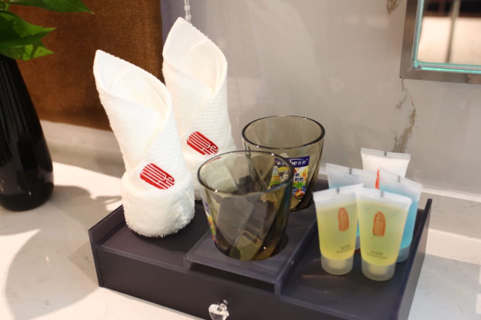 Shower, free toiletries, hair dryer, slippers