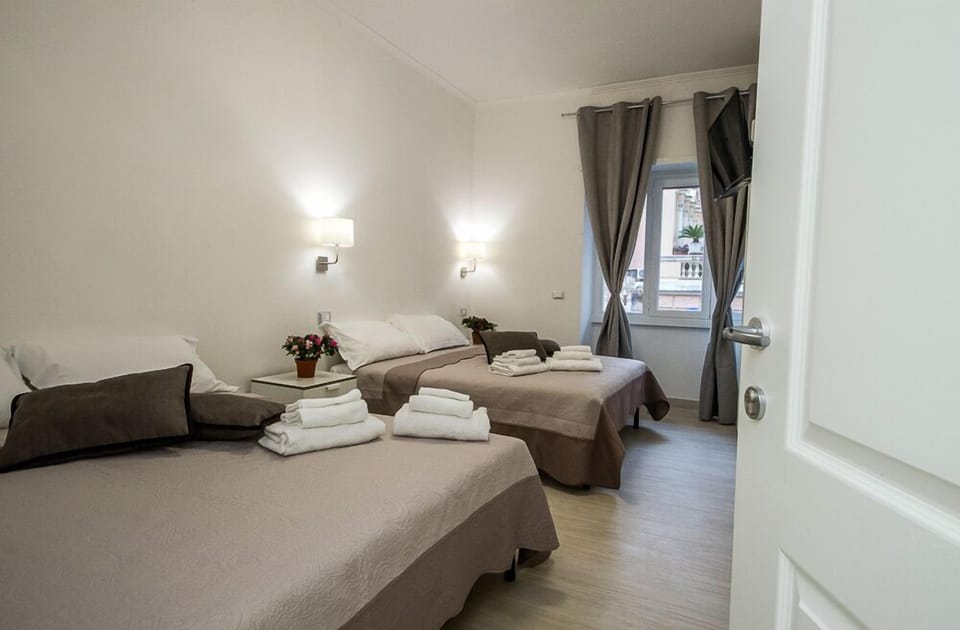Quadruple Room | Premium bedding, minibar, desk, soundproofing