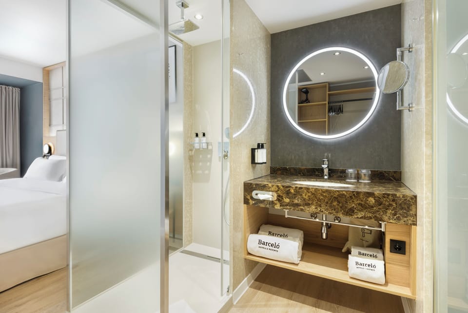 Eco-friendly toiletries, hair dryer, towels