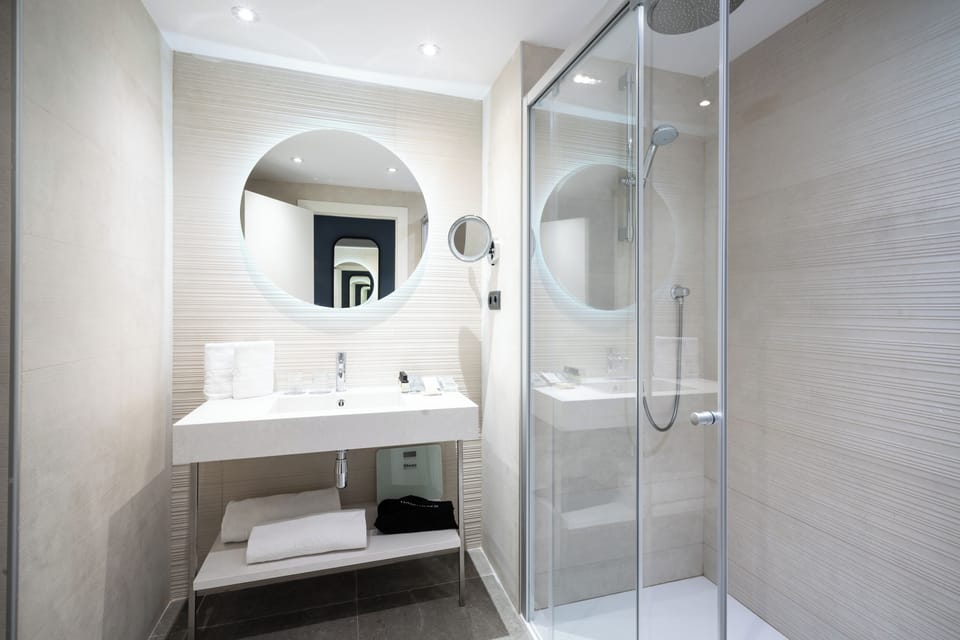 Eco-friendly toiletries, hair dryer, towels