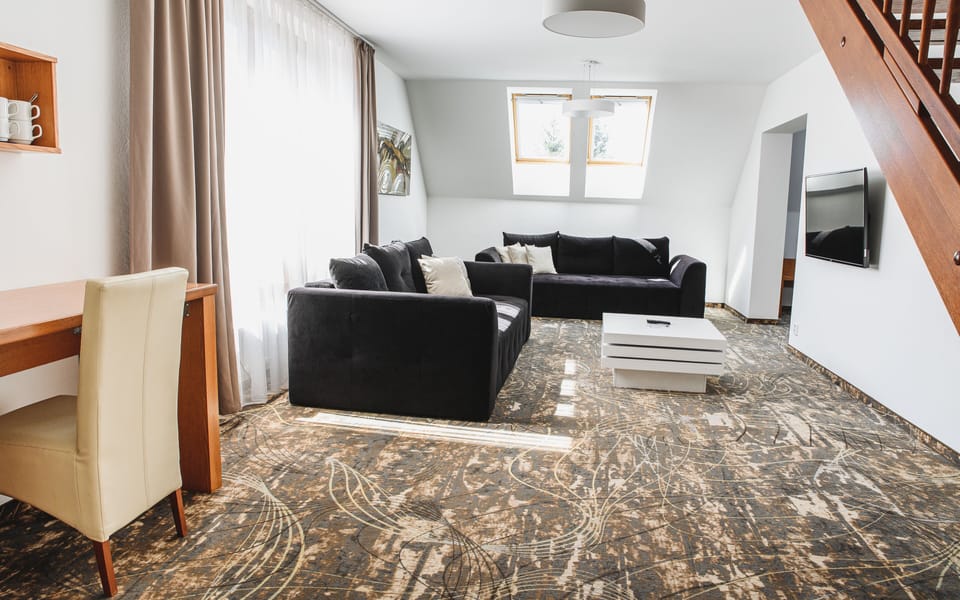 Exclusive Suite, 3 Bedrooms | Living room | TV