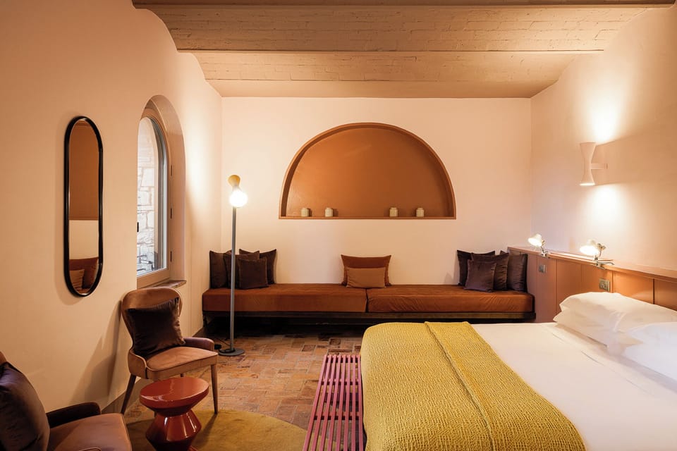 Garden Junior Suite | Minibar, in-room safe, desk, iron/ironing board