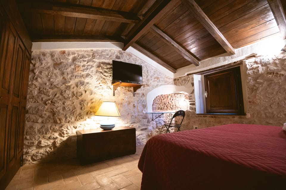 Quadruple Room (La Pietra Lunare) | Premium bedding, down comforters, memory foam beds, laptop workspace