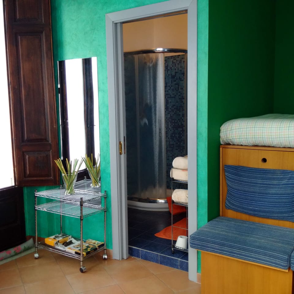 Basic Triple Room, Balcony, City View | Bathroom | Shower, free toiletries, hair dryer, bidet