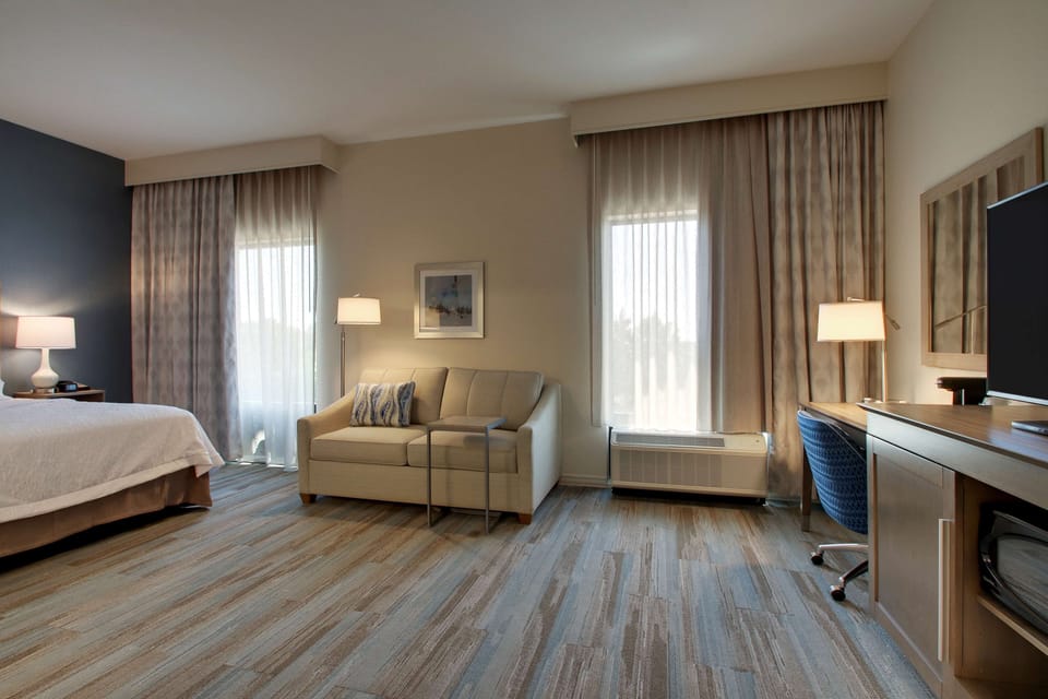 In-room safe, blackout drapes, iron/ironing board, cribs (free)