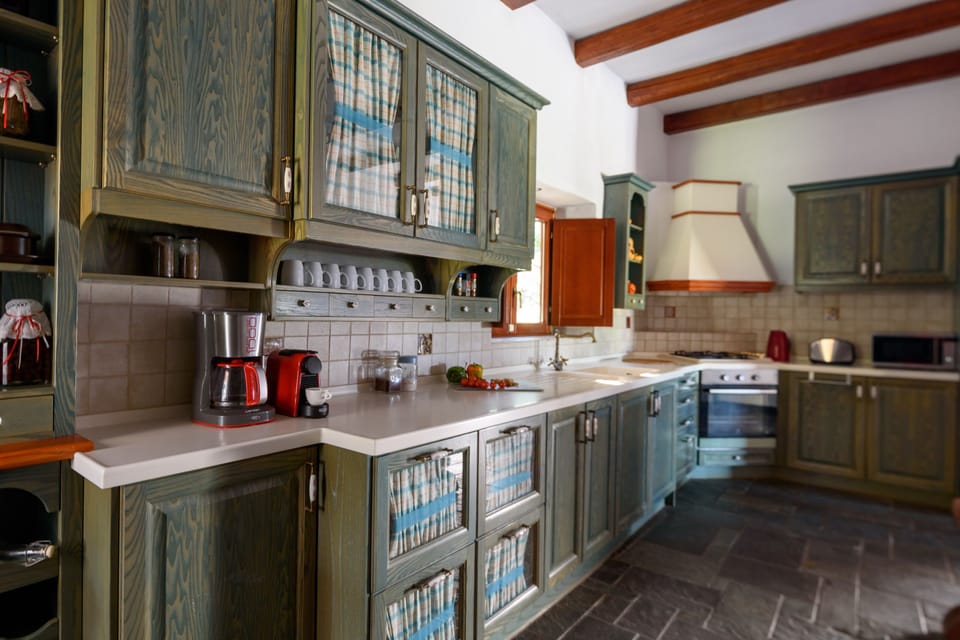 Luxury Villa | Private kitchen | Full-size fridge, microwave, oven, stovetop