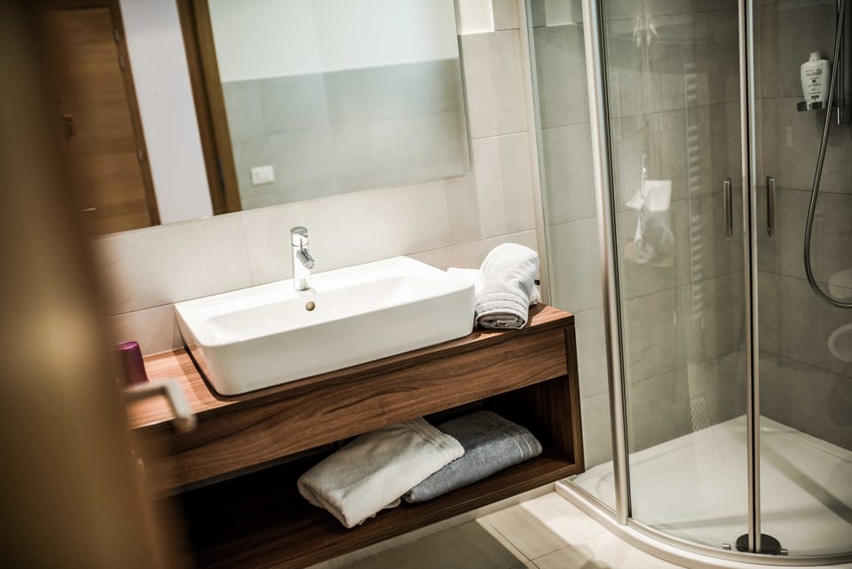 Shower, free toiletries, hair dryer, bathrobes