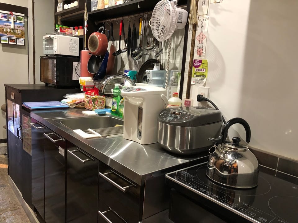 Traditional Townhome, 4 Bedrooms, Non Smoking, City View | Private kitchen | Fridge, microwave, stovetop, coffee/tea maker