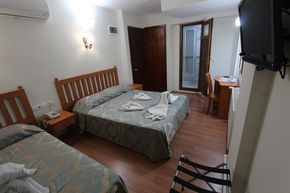 Triple Room | Premium bedding, soundproofing, iron/ironing board, free WiFi