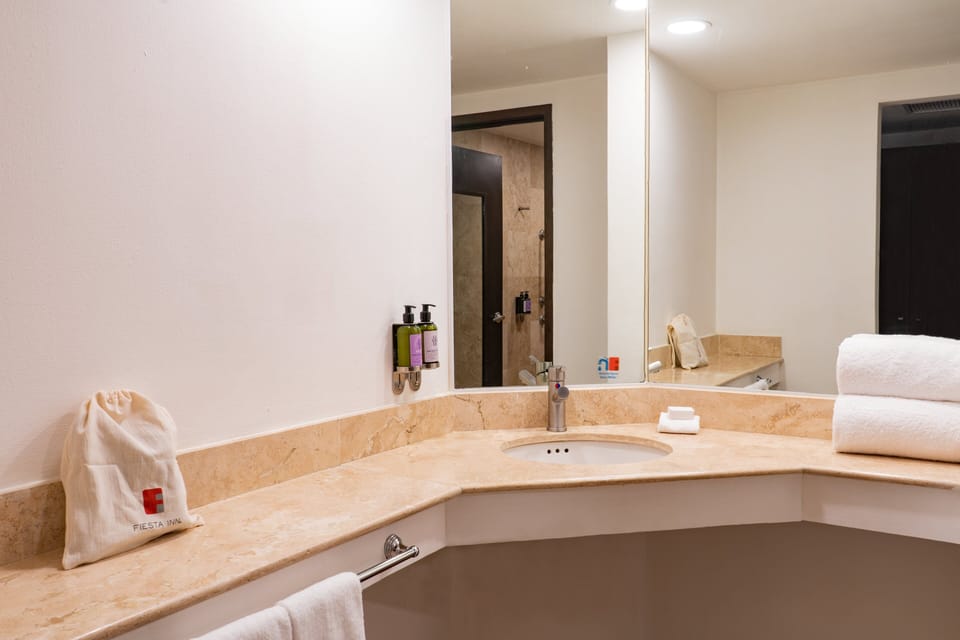 Shower, free toiletries, hair dryer, bathrobes