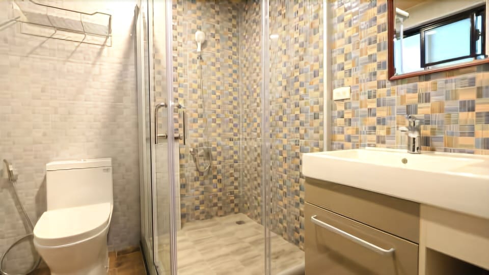 Shower, free toiletries, hair dryer, slippers