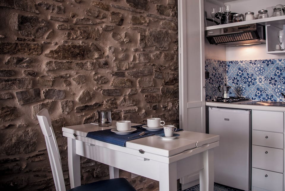 Junior Suite, Balcony, Sea View | Private kitchen | Full-size fridge, oven