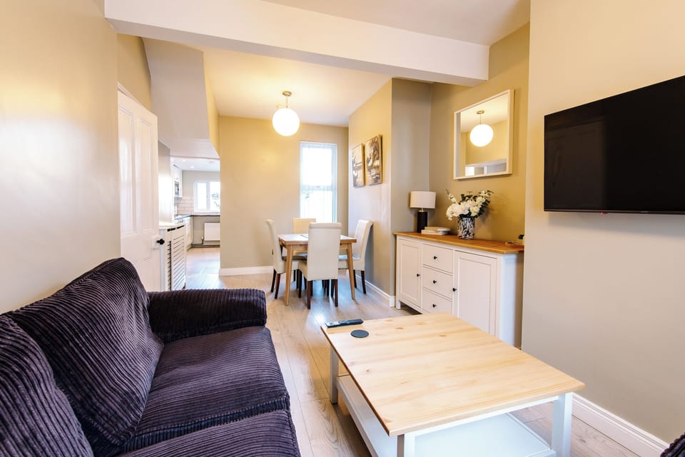 Townhome | Living area | 32-inch flat-screen TV with digital channels, TV