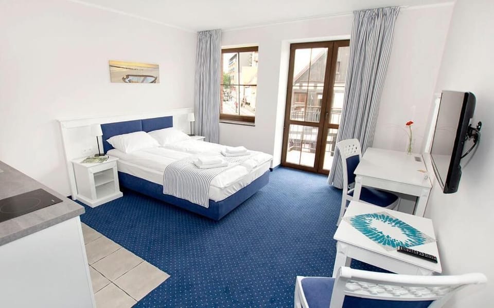 Desk, iron/ironing board, cribs/infant beds, rollaway beds