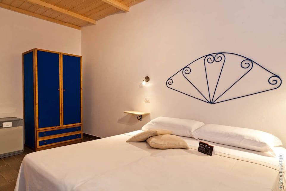 Economy Double Room, Garden View | Minibar, desk, free WiFi