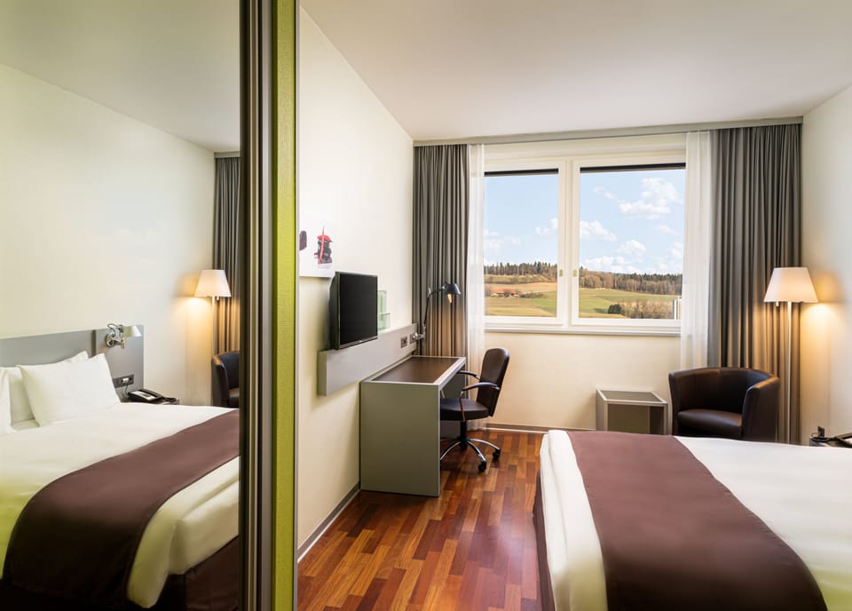 Hypo-allergenic bedding available, in-room safe, desk, laptop workspace