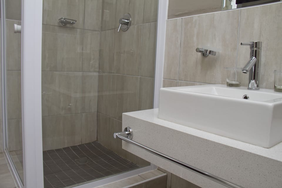 Shower, rainfall showerhead, eco-friendly toiletries, hair dryer