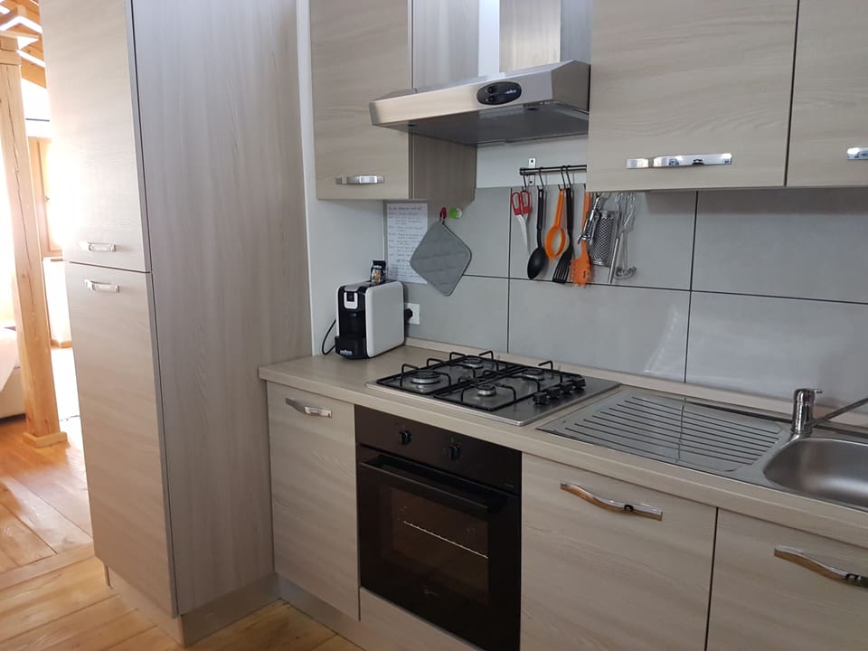 Superior Loft, Balcony, Pool View | Private kitchenette | Fridge, microwave, stovetop, coffee/tea maker