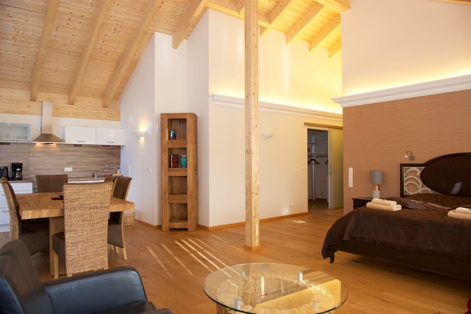 Deluxe Suite, 1 King Bed, Bathtub, Mountain View | Living area | Flat-screen TV