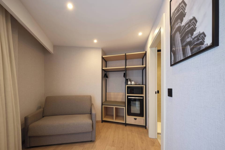 Premium Triple Room, Terrace (Pool) | In-room safe, desk, iron/ironing board, free WiFi
