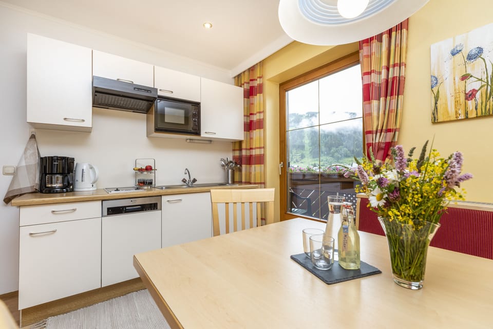 Classic Apartment, 2 Bedrooms | Private kitchen | Fridge, microwave, stovetop, dishwasher