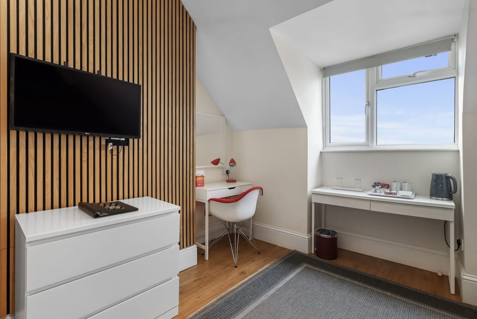 Double Room (Attic) | Hypo-allergenic bedding, desk, blackout drapes, iron/ironing board