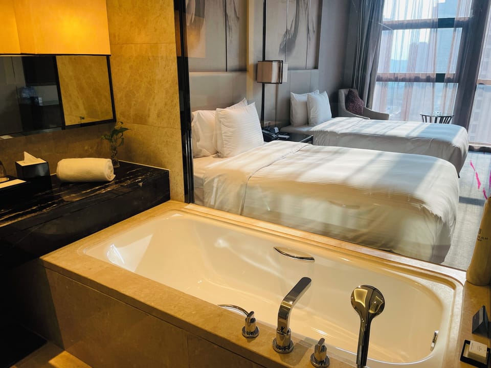 Separate tub and shower, free toiletries, hair dryer, bathrobes