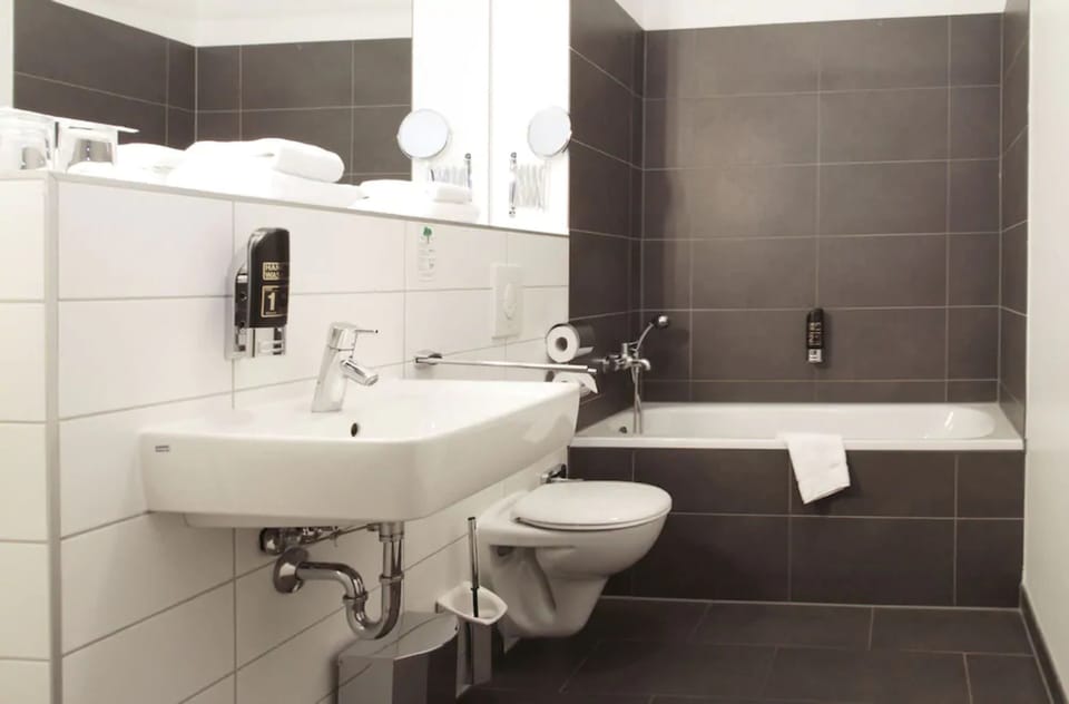 Shower, eco-friendly toiletries, hair dryer, towels