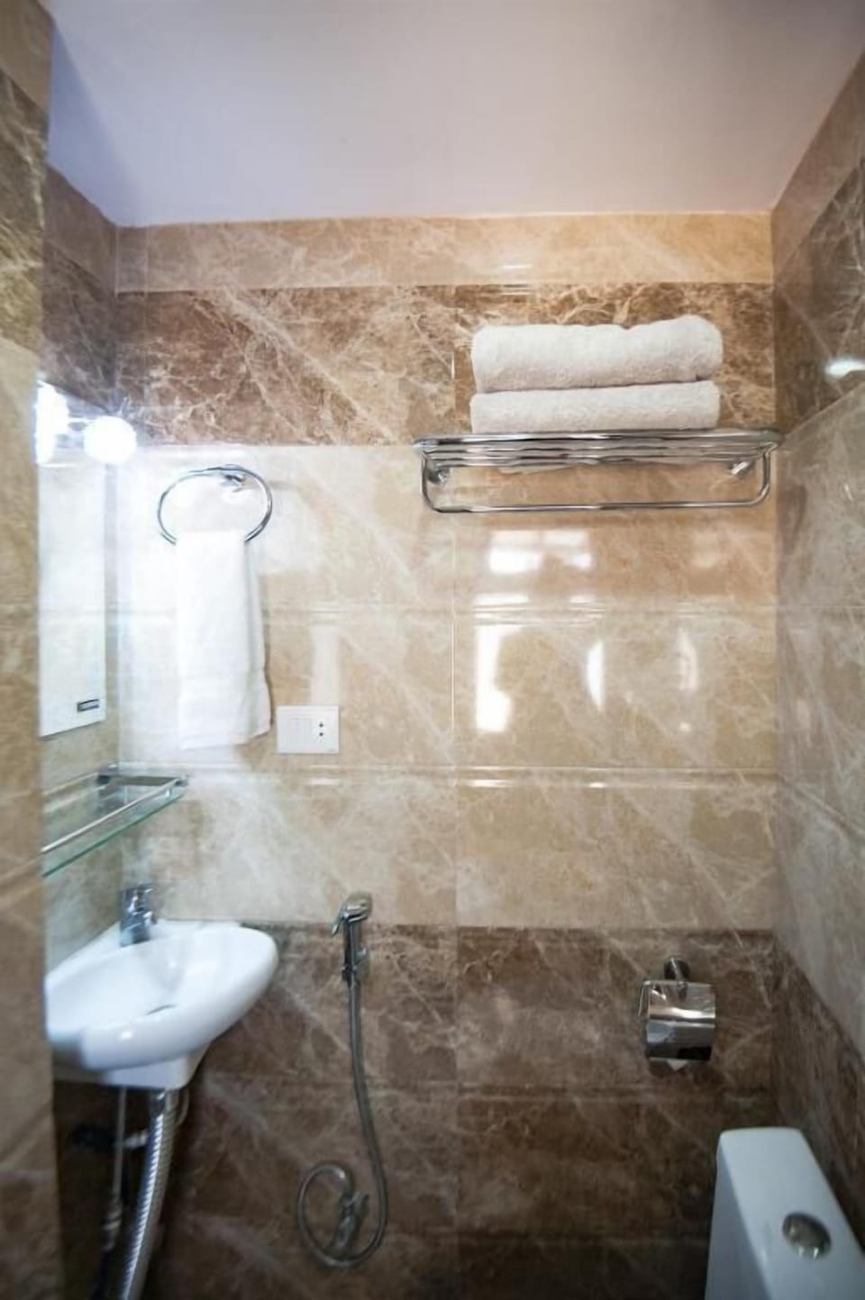 Shower, free toiletries, slippers, towels