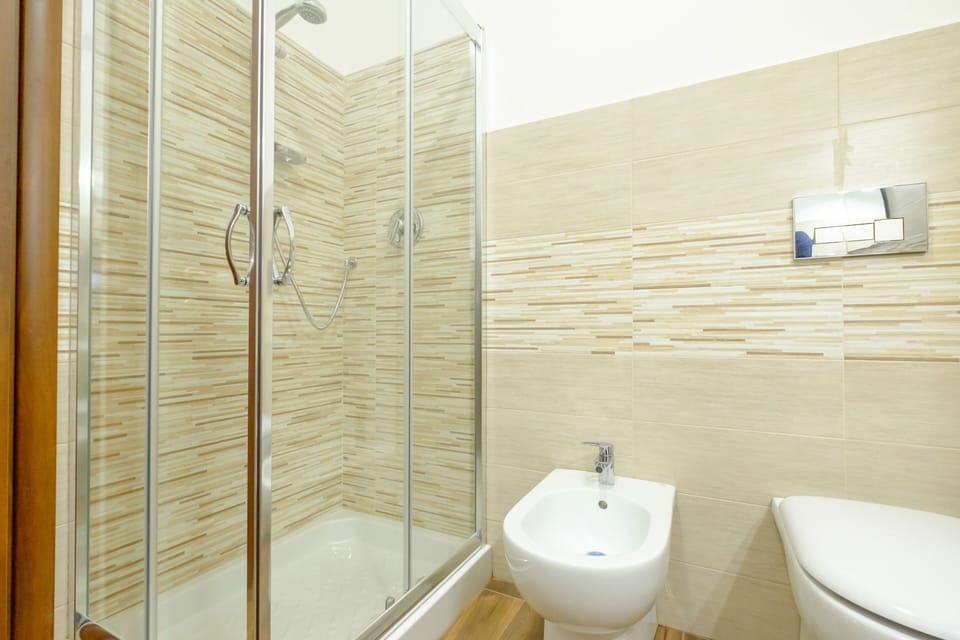Family Suite, 2 Bedrooms, Connecting Rooms, Sea View | Bathroom | Shower, free toiletries, bidet, towels
