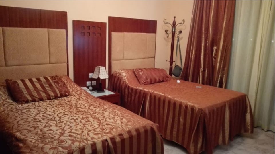 Double Room | Desk, blackout drapes, WiFi (free), bed sheets