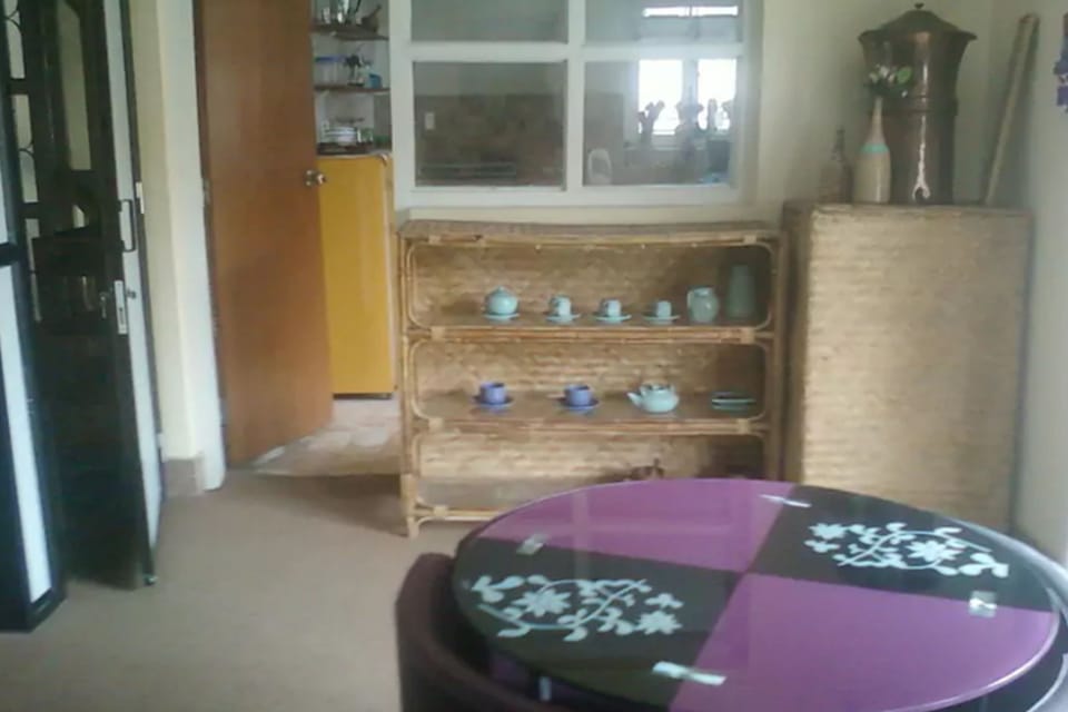 Deluxe Room | Living area | Flat-screen TV