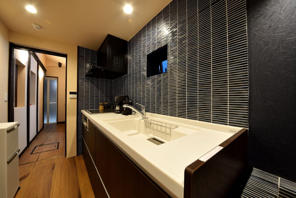 Fridge, microwave, stovetop, coffee/tea maker