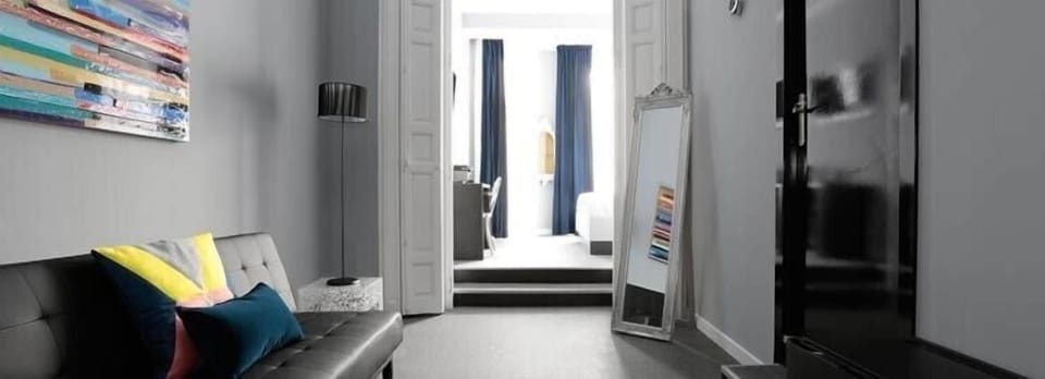 Suite (2 Adults + 2 Children) | Living area | Flat-screen TV, fireplace