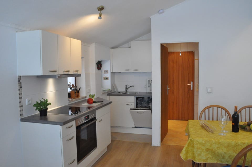 Deluxe Apartment, Terrace and Balcony | Living room | Flat-screen TV