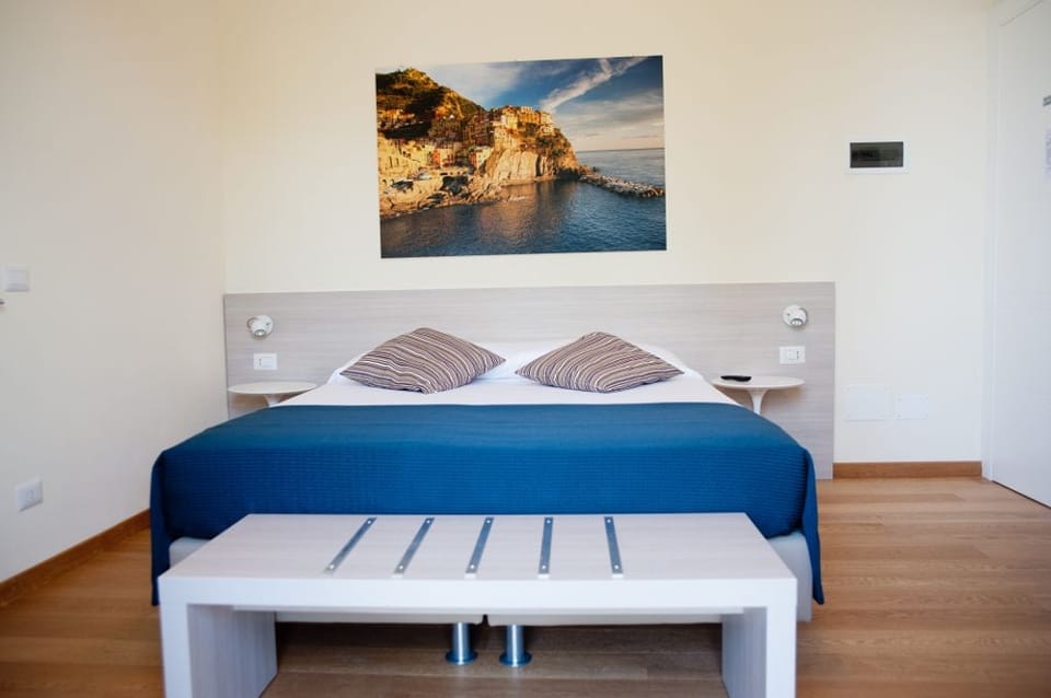 Standard Double Room, Balcony, Sea View | Minibar, in-room safe, desk, free WiFi